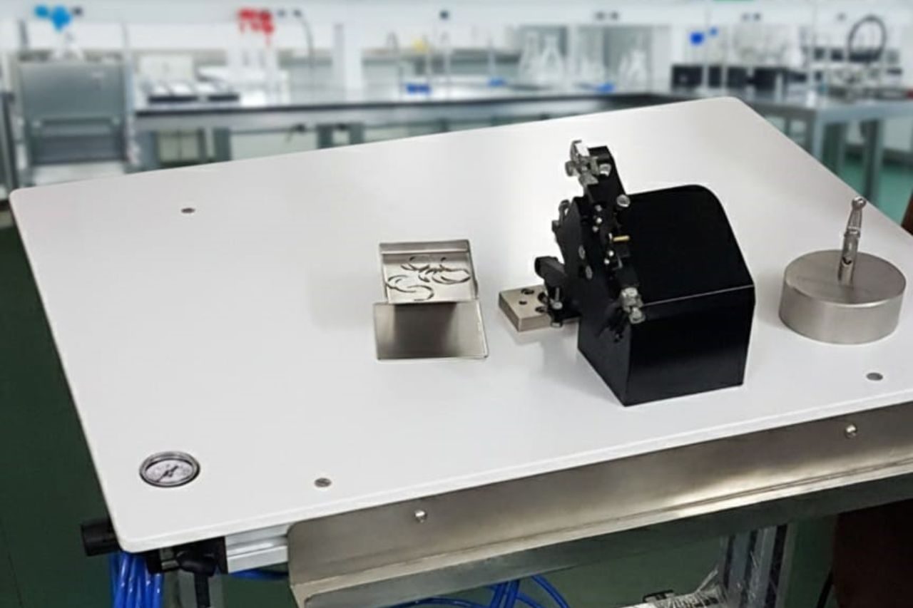 Table Mounted Needle Attaching Machine